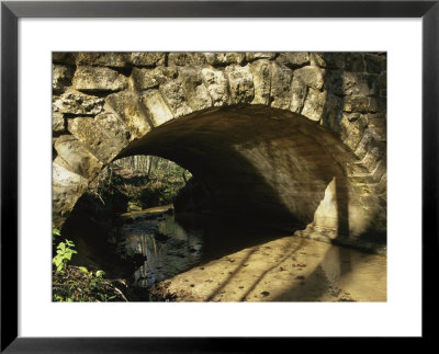 A Stone Bridge Spans A Gentle Clear Creek by Raymond Gehman Pricing Limited Edition Print image