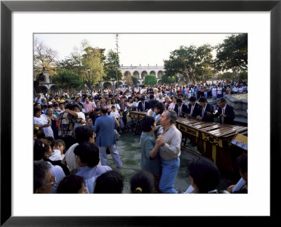 Sunday Dancing In Parque Central, Antigua, Guatemala, Central America by Upperhall Pricing Limited Edition Print image