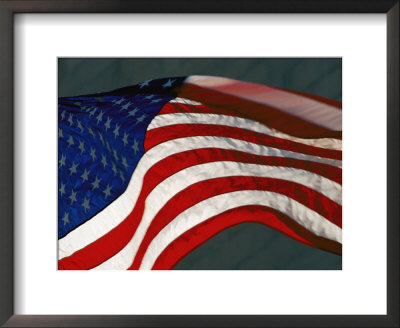 Close View Of One Of The American Flags Surrounding The Washington Monument by Kenneth Garrett Pricing Limited Edition Print image
