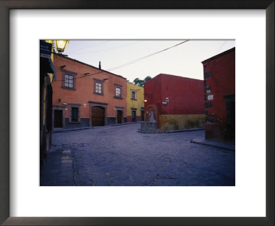 Cobblestone Streets And Colorful Buildings In San Miguel De Allende by Gina Martin Pricing Limited Edition Print image