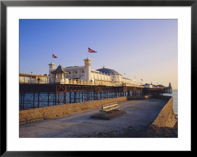 Palace Pier In Evening Light, Brighton, Sussex, England by Roy Rainford Pricing Limited Edition Print image