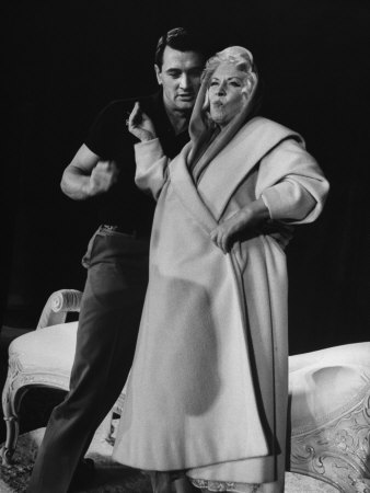 Actor Rock Hudson Moving In To Embrace Mae West During Rehearsal For 30Th Annual Academy Awards by Leonard Mccombe Pricing Limited Edition Print image