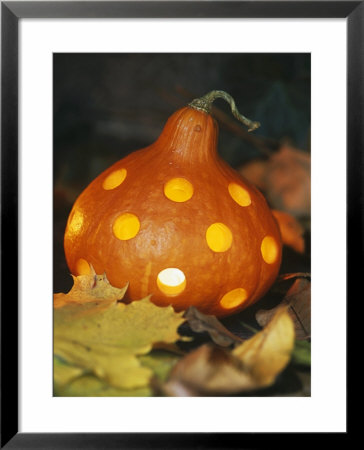 Hollowed Out Pumpkin With Holes And Light Inside by Alena Hrbkova Pricing Limited Edition Print image