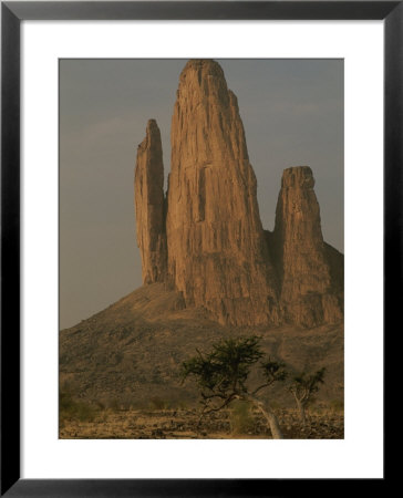 Five Spires, Dubbed The Hand Of Fatima, Jut Out Of The Flat Desert by Bobby Model Pricing Limited Edition Print image