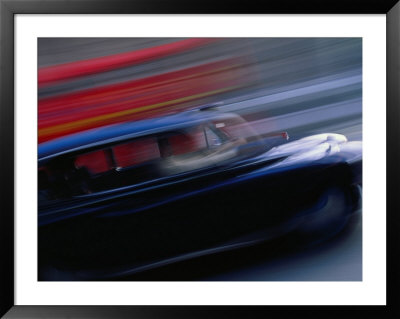 Black London Taxi Cab Moving Alongside Double-Decker Bus, London, England by Angus Oborn Pricing Limited Edition Print image