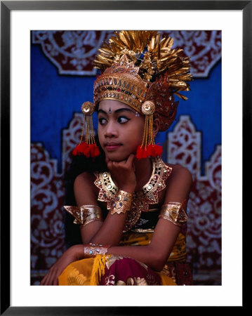 A Situ Dancer Relaxes On Temple Steps In Singapadu, Sampalan, Indonesia by Adams Gregory Pricing Limited Edition Print image