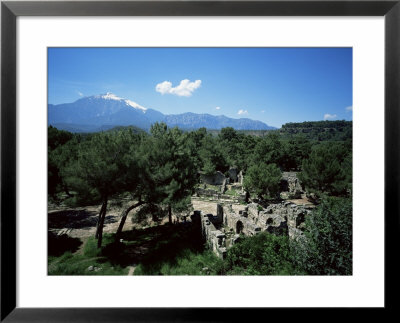 The Ruins Of Phaselis, With The Tehtel Mountain In The Background, Anatolia, Turkey by Marco Simoni Pricing Limited Edition Print image