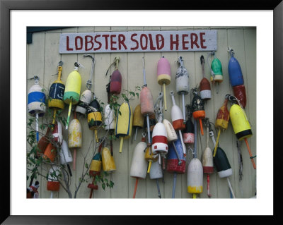 Colorful Lobster Buoys Hang On A New England Shed by Stephen St. John Pricing Limited Edition Print image