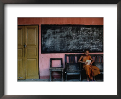 Young Monk Reading In Classroom, Chiang Mai, Thailand by Bill Wassman Pricing Limited Edition Print image