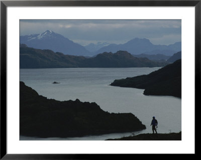 A Hiker Explores Above Taraba Sound, A Remote Chilean Fjord by Gordon Wiltsie Pricing Limited Edition Print image
