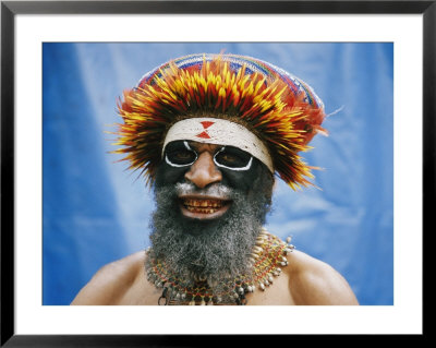 A Huli Tribesperson Smiles For The Camera by Jodi Cobb Pricing Limited Edition Print image