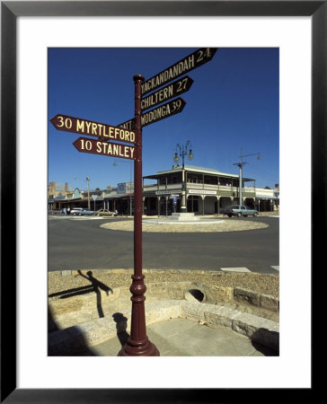 Direction Signs At Corner Of Ford And Albert Streets, Beechworth, Victoria, Australia by Richard Nebesky Pricing Limited Edition Print image