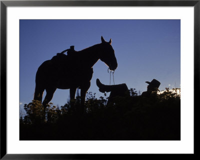 Silhouette Of Cowboy Resting With Horse, Seneca, Or by Inga Spence Pricing Limited Edition Print image
