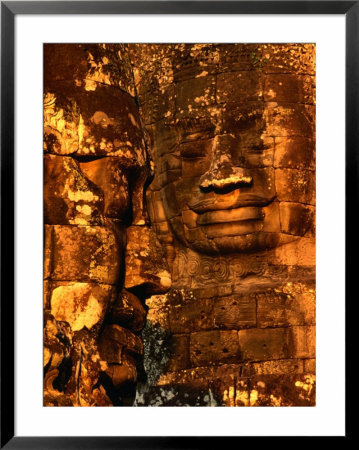 Smiling Lokesvara Bodhisattva Image Adorning The Bayon Temple Of Angkor Thom, Angkor, Cambodia by John Banagan Pricing Limited Edition Print image