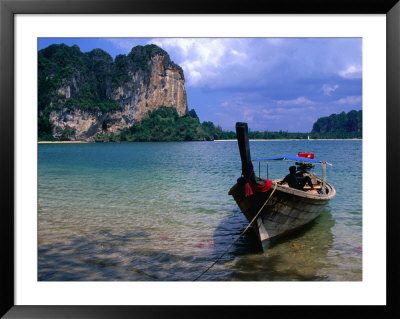 Traditional Boat In Ao Rei Leh (Bay Of Railay), Rai Leh Bay, Thailand by Nicholas Reuss Pricing Limited Edition Print image