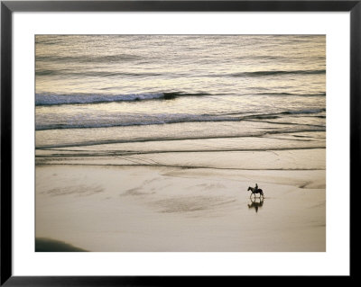 Elevated View Of A Horseback Rider Near Gold Beach by Phil Schermeister Pricing Limited Edition Print image