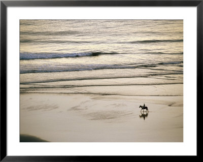Elevated View Of A Horseback Rider Near Gold Beach by Phil Schermeister Pricing Limited Edition Print image