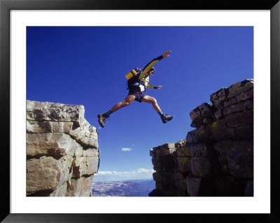 Hiker Jumping, High Uintas, Ut by Cheyenne Rouse Pricing Limited Edition Print image