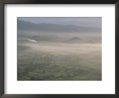 Aerial View Of Teotihuacan Area In Early Morning Fog by Kenneth Garrett Pricing Limited Edition Print image