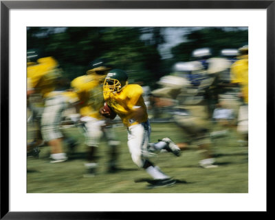 High School Football Player Carrying The Ball by Brian Gordon Green Pricing Limited Edition Print image