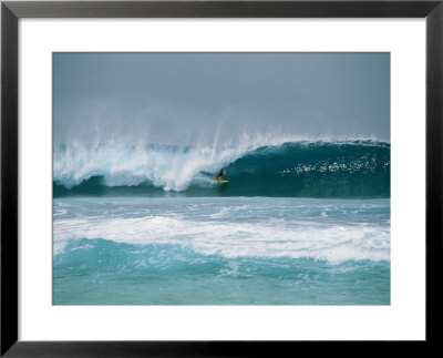 Surfer In The Crest Of A Wave In The Bonsai Pipeline In Oahu by Todd Gipstein Pricing Limited Edition Print image