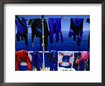 Wetsuits Drying On Live-Aboard Dive Boat In Straits Of Gubal, Egypt by Jean-Bernard Carillet Pricing Limited Edition Print image