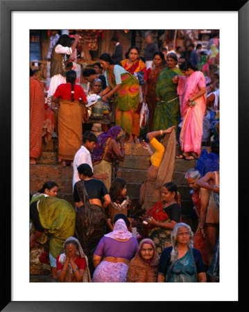 Pilgrims At Dasaswamedh Ghat Take Ritual Bath In The Ganges, Varanasi, Uttar Pradesh, India by Greg Elms Pricing Limited Edition Print image
