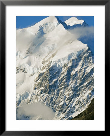 Clouds Drift Past Snowy Mt. Cook On New Zealands South Island by Mark Cosslett Pricing Limited Edition Print image