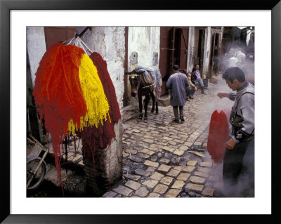Man Hangs Dyed Wool In The Medina, Fes, Morocco by John & Lisa Merrill Pricing Limited Edition Print image
