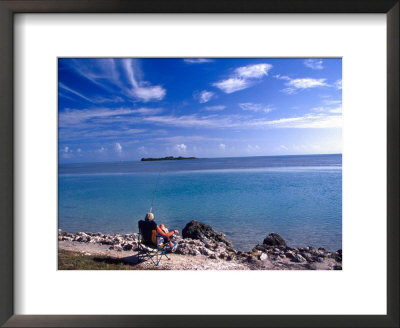 Fisherman In Beach Chair, Florida Keys, Florida, Usa by Terry Eggers Pricing Limited Edition Print image