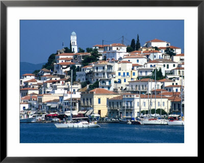 Waterfront And Town Behind Poros Harbour, Poros Town, Greece by Mark Daffey Pricing Limited Edition Print image