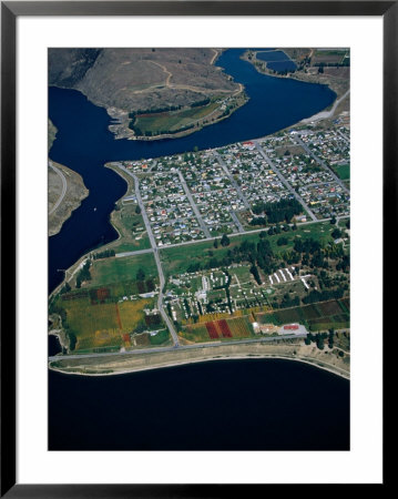 Aerial View Of Lake Dunstan Snaking Its Way Around Cromwell, Cromwell, Otago, New Zealand by David Wall Pricing Limited Edition Print image