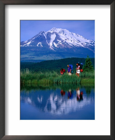 Mother And Two Children Backpacking With Mt. Shasta In The Background, Mt. Shasta, Usa by Mark & Audrey Gibson Pricing Limited Edition Print image