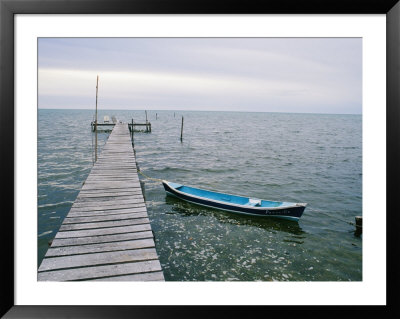 Canoe Tied To A Long Wooden Dock by Stephen Alvarez Pricing Limited Edition Print image