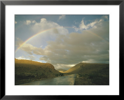 A Rainbow Arches Over A Road In Mexico by Walter Meayers Edwards Pricing Limited Edition Print image