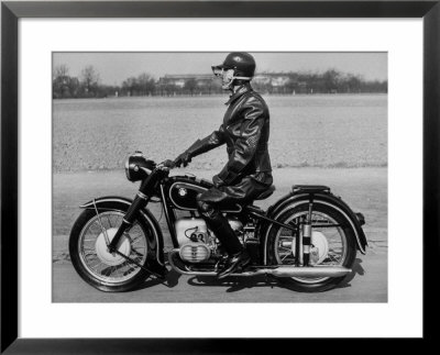 German Made Bmw Motorcycle With A Rider Dressed In Black Leather by Ralph Crane Pricing Limited Edition Print image