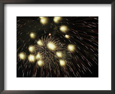 Bright And Colorful Fireworks Exploding In The Night Sky by Mark Gibson Pricing Limited Edition Print image