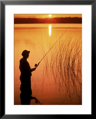 Silhouette Of Man Fishing, Vilas City, Wi by Ken Wardius Pricing Limited Edition Print image