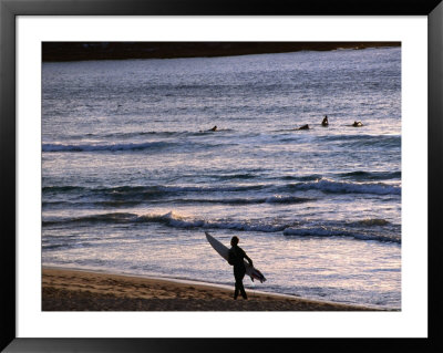 Surfers At Sunrise On Bondi Beach, Sydney, Australia by Glenn Beanland Pricing Limited Edition Print image