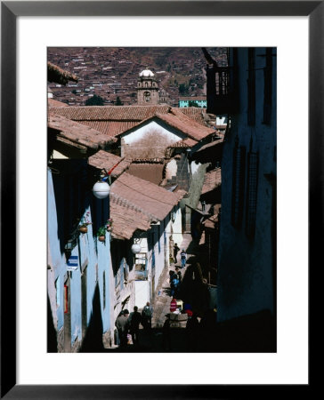 Steep And Narrow Hatunrumiyoc Street, With La Merced Tower In Distance, Cuzco, Peru by Richard I'anson Pricing Limited Edition Print image