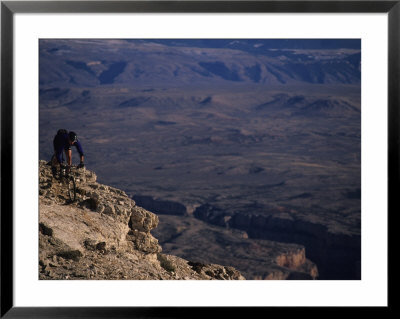 Male Mountain Biking In The Pryor Mountains Of Wyoming by Bobby Model Pricing Limited Edition Print image