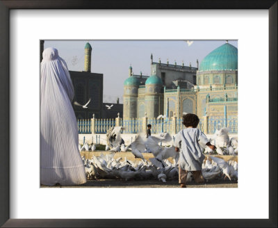 Lady In Burqa Feeding Famous White Pigeons Whilst Child Chases Them, Balkh, Afghanistan by Jane Sweeney Pricing Limited Edition Print image