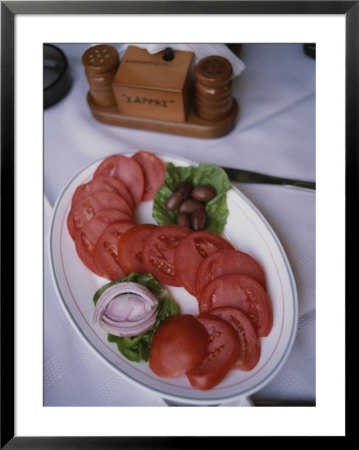 Sliced Roma Tomatoes Fill A Plate At Samis Restaurant In Rhodes by Tino Soriano Pricing Limited Edition Print image