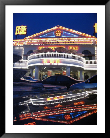 A Karaoke Bar On Dongsanhuan Road Is Reflected In A Vehicles Trunk by Richard Nowitz Pricing Limited Edition Print image
