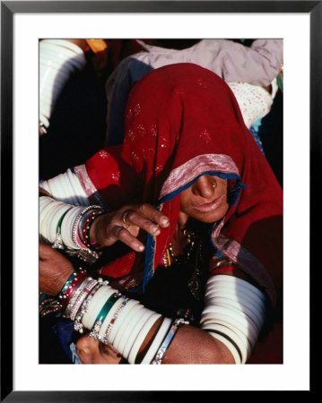 Woman At Pushkar Camel Fair, Pushkar, Rajasthan, India by Richard I'anson Pricing Limited Edition Print image