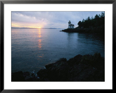 The Lime Kiln Lighthouse Casts Its Warning Beacon by Phil Schermeister Pricing Limited Edition Print image