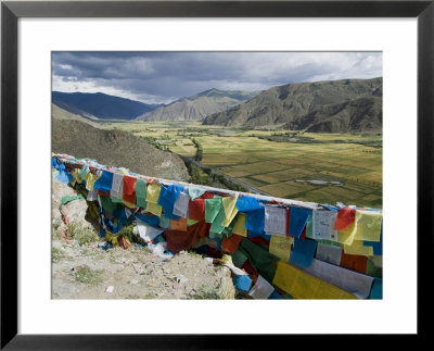 Prayer Flags And View Over Cultivated Fields, Yumbulagung Castle, Tibet, China by Ethel Davies Pricing Limited Edition Print image