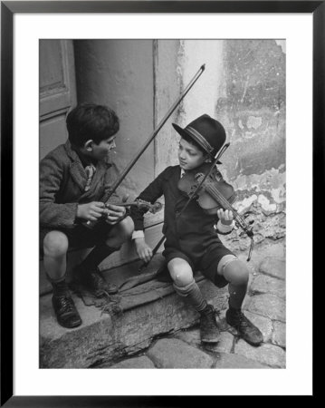 Gypsy Children Playing Violin In Street by William Vandivert Pricing Limited Edition Print image