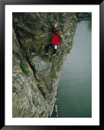 A Man Climbs Above A Canoe In The River by Dugald Bremner Pricing Limited Edition Print image