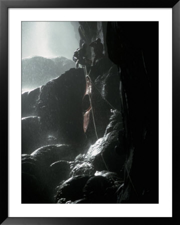 Lowering Kayak Into A Wet Cave, Mexico by Michael Brown Pricing Limited Edition Print image